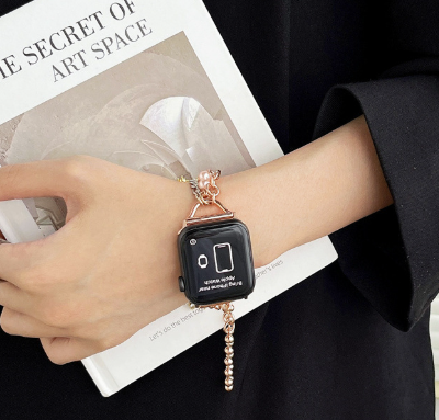 Women’s pearl and metal chain watch with small fragrance pendant and elegant quartz dial