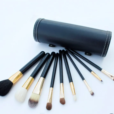 Barrel makeup brush set with ergonomic handles and soft synthetic bristles for professional makeup application