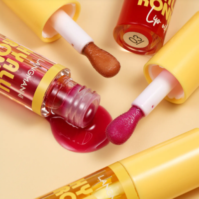 6 Colors Transparent Hyaluronic Acid Lip Balm Gloss with grape, cherry, chocolate and crystal shades for hydrating and glossy lips