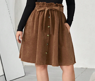 Women wearing a retro high-waist umbrella skirt made of polyester with a flared A-line silhouette for casual and elegant fashion style