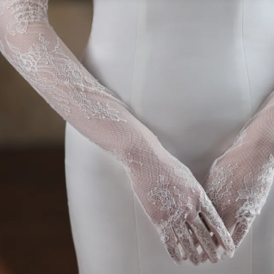 Elegant white lace tulle bridal gloves with fairy-inspired wedding style design