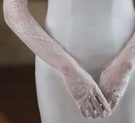 Elegant white lace tulle bridal gloves with fairy-inspired wedding style design