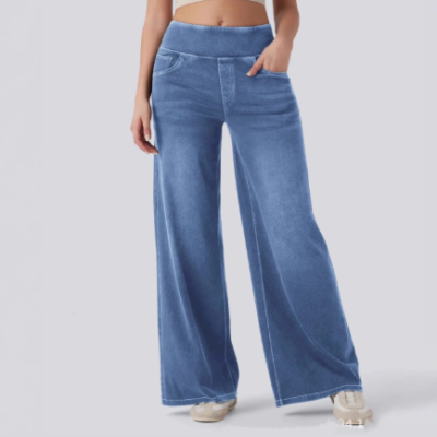 Woman wearing high-waisted loose-fitting zip-fly wide-leg denim jeans with casual streetwear outfit
