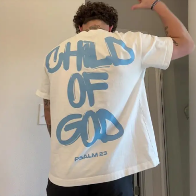 Child Of God Print T-Shirt with inspirational graphic design and soft breathable fabric for casual faith-inspired style in the UK and USA.