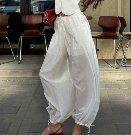 Women's lace-up ankle-cinching semi-sheer trousers